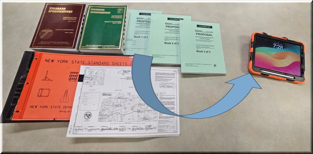 A photo of a NYSDOT digital inspection device (tablet) showing how the device replaces many paper/analog tools.